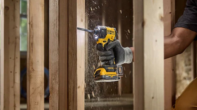 20V Max XR ¼-inch Quiet Hydraulic Impact Driver being used on wood