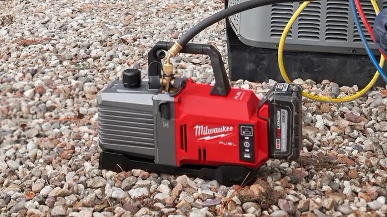 M18 5 CFM Fuel Vacuum Pump on the ground