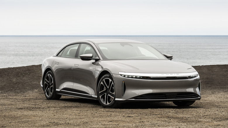 Lucid Air sedan parked on the beach