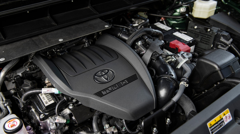 The engine compartment of a 2025 Toyota Highlander.