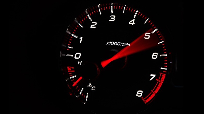 Close-up of a car's tachometer