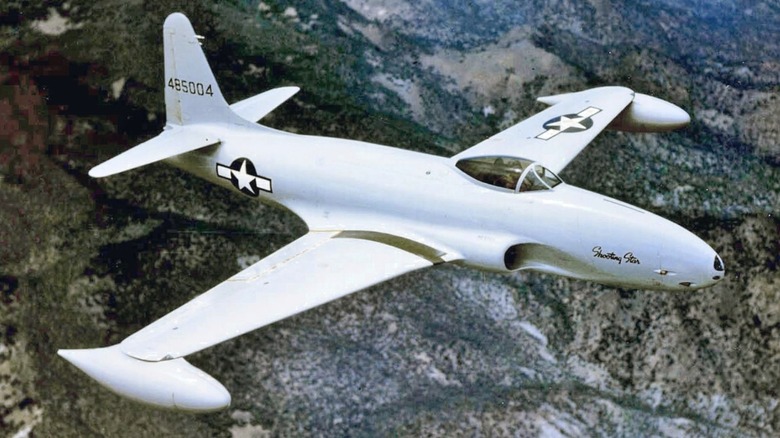 A P-80A-1-LO Shooting Star flying over desert hills