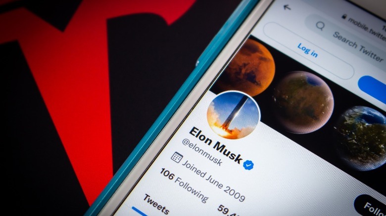 Elon Musk Twitter account on phone screen