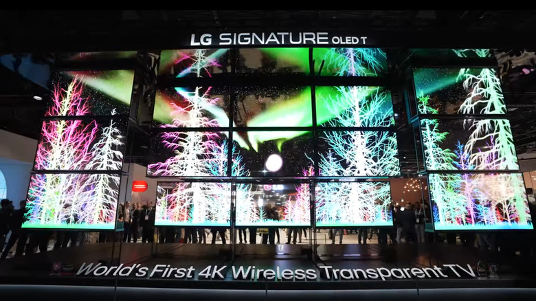 Several transparent LG OLED TVs on display