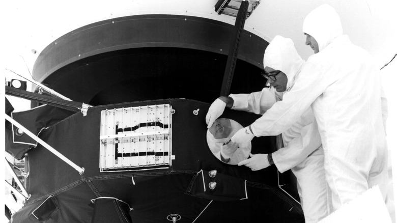 Engineers secure the cover over the Voyager 1 Golden Record in 1977.