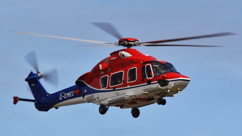 An Airbus H175 G-EMEC MG flying through clear blue skies
