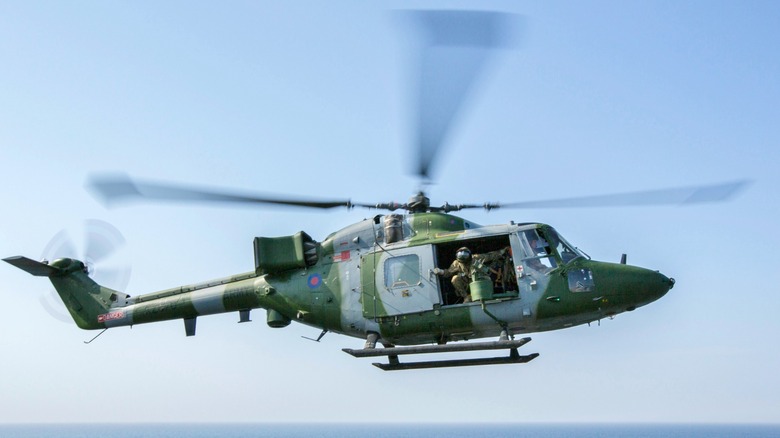 A British Army Westland Lynx descending to land on an amphibious assault ship