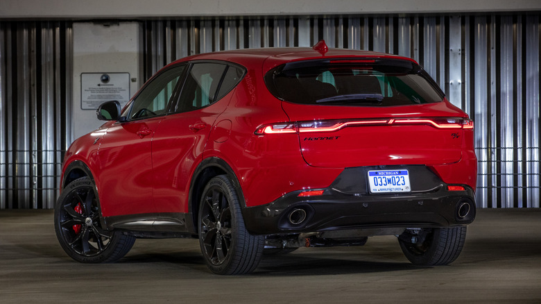 2025 Dodge Hornet R/T model in Hot Tamale red, rear 3/4 view