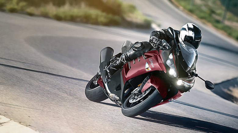 2025 Kawasaki Ninja ZX-14R cornering on a curvy road