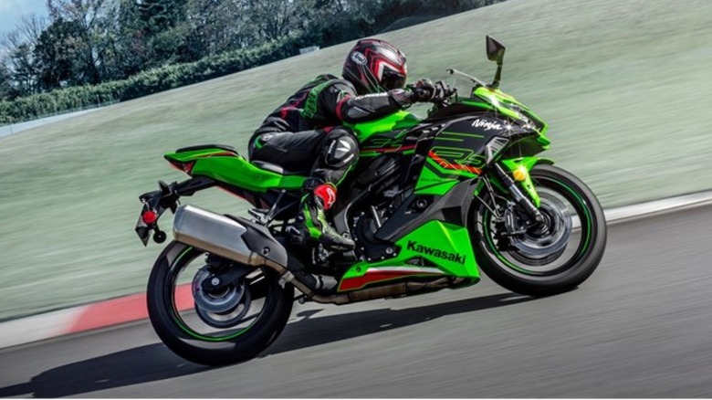 The ZX-4RR KRT Edition shown at speed on a closed course.