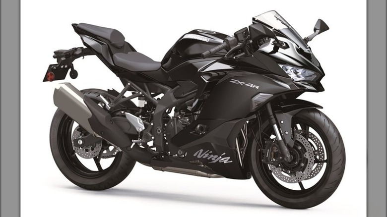 The 2025 Kawasaki ZX-4R isolated on a white background.