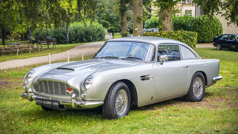 Aston Martin DB5 on grass, front 3/4 view