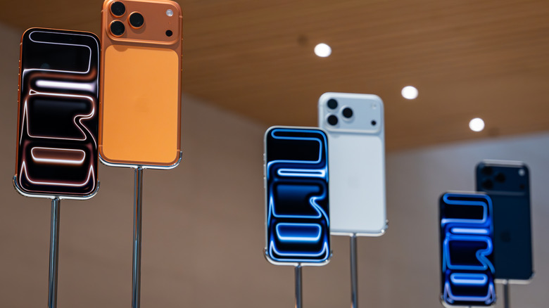 iPhone 17 Pro and iPhone 17 Pro Max models are displayed inside the Apple Inc. store