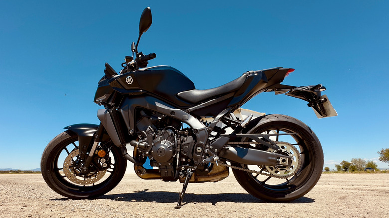 A Yamaha MT-09 on a dirt road
