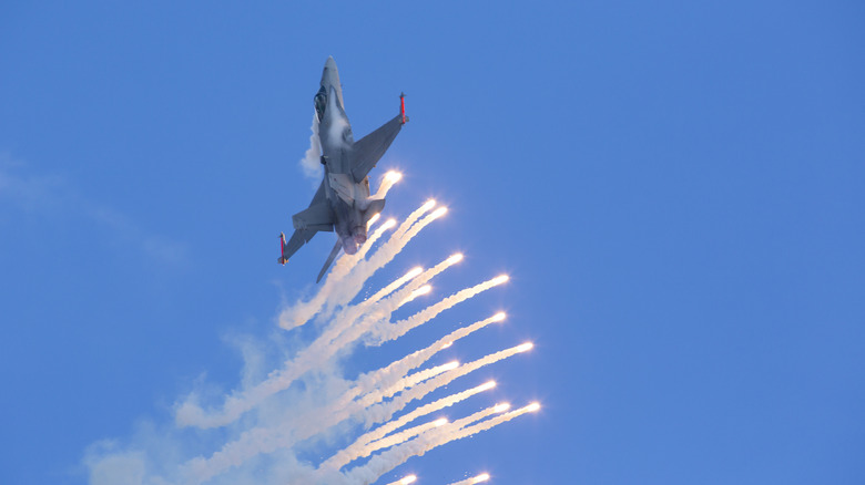F-18 releasing countermeasure flares