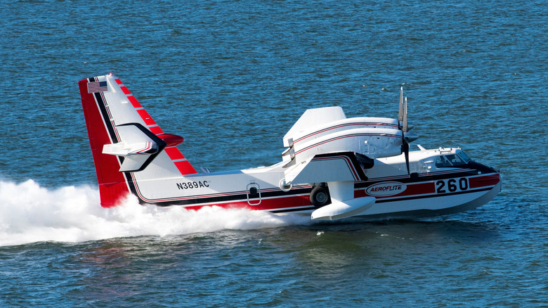 Super Scooper aircraft on lake