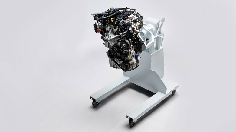 Ford 1.0L EcoBoost engine on a stand