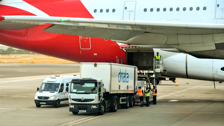 A Qantas A380 being loaded with cargo