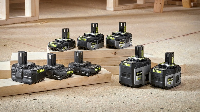 Ryobi 18V One+ batteries displayed on the ground