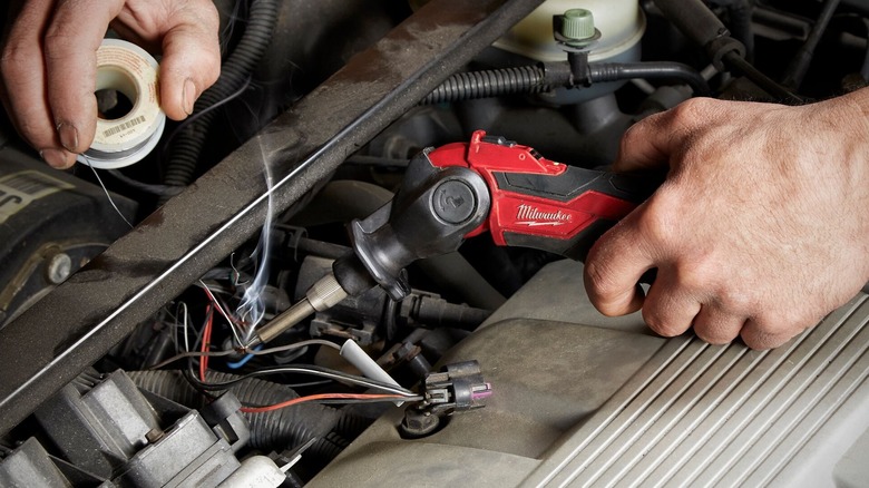 Milwaukee M12 soldering gun in use