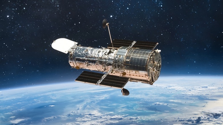 Hubble space telescope above Earth