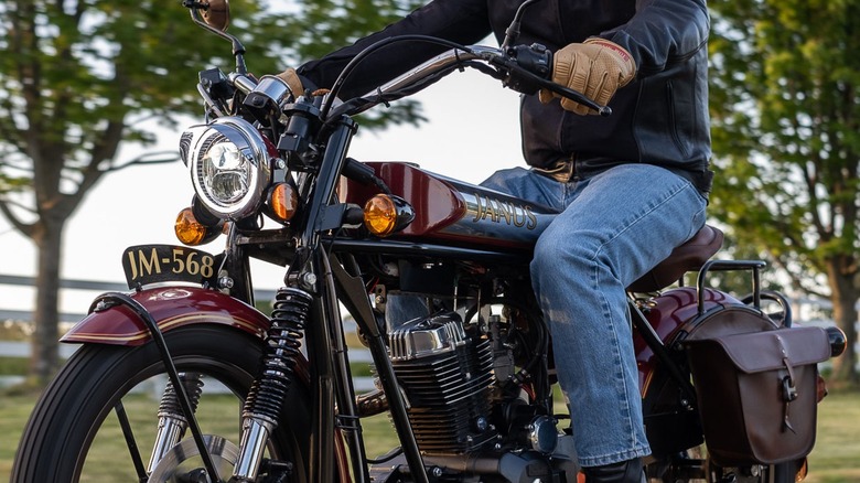 Person riding Janus motorcycle