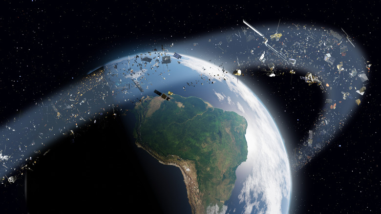 Illustration of space junk orbiting the Earth in a ring.