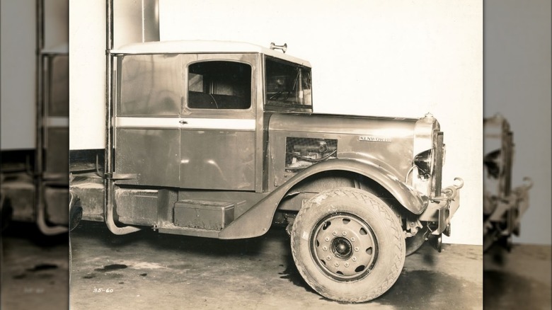 A Kenworth truck from 1933 showing the diesel engine, vertical exhaust, and sleeper cab.