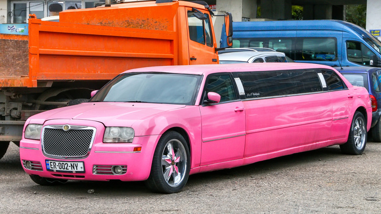 Front view of pink Chrysler 300 limo