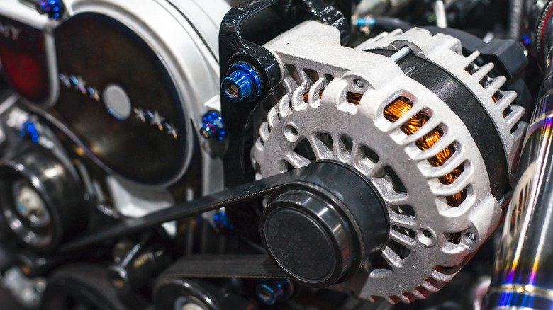 Alternator mounted on engine with belt