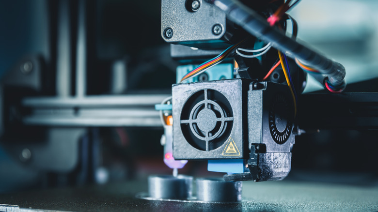 Modern 3d printer producing a new prototype model