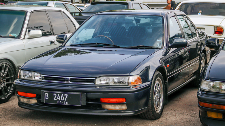 front view of Black Honda Accord in parking lot at car show