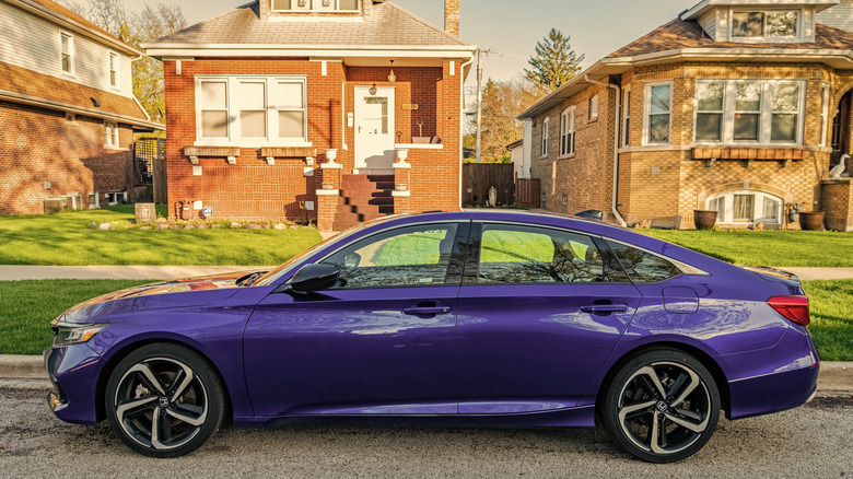 Purple 2020 Honda Accord parked curbside in front of brick houses