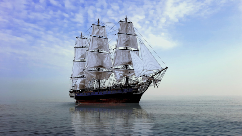 Drawn illustration of two ships passing by each other on the sea