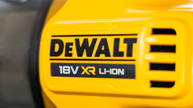 The DeWalt logo on a tool.