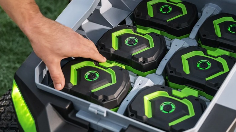Loading batteries into an Ego lawn tractor