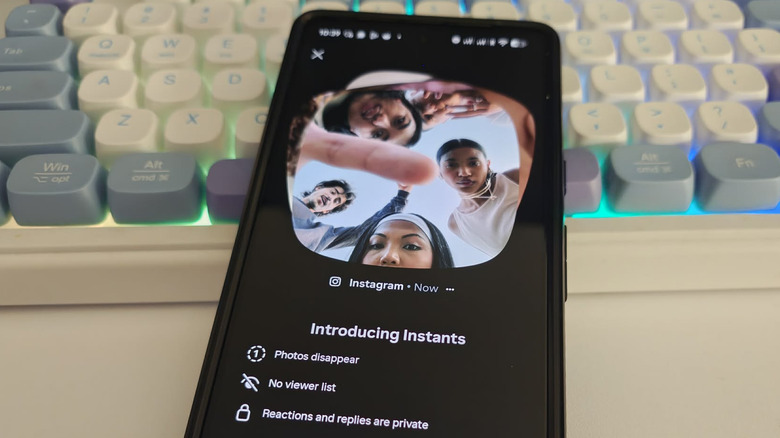 An ad showing the Instagram Instants feature is on the screen of an Android phone