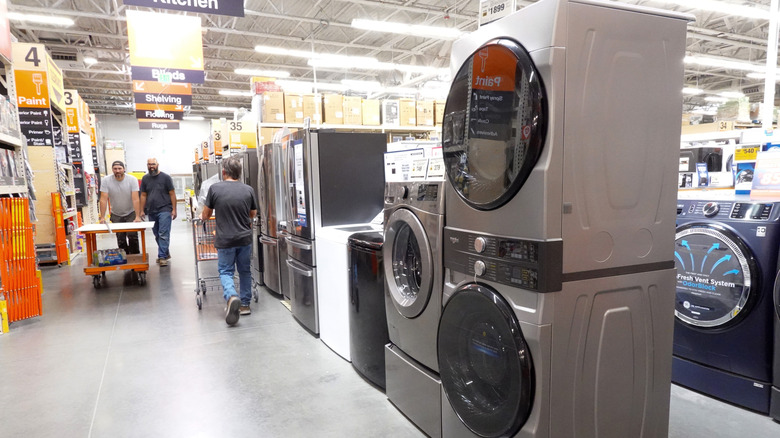 New Whirlpool washers on display in a Home Depot.
