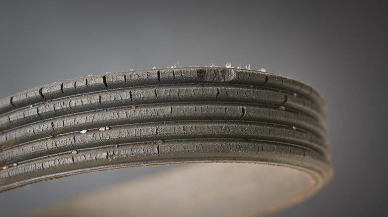 Close-up of heavily worn serpentine belt