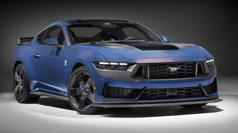 A 2024 Dark Horse Carbon Fiber Ford Mustang with six speed manual transmission