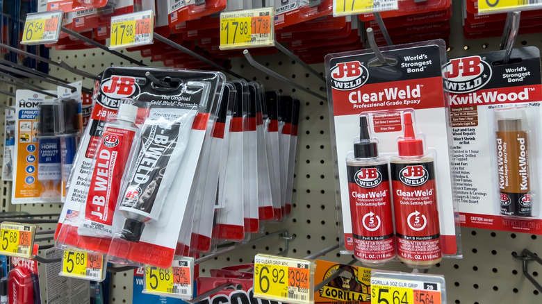 J-B Weld products shown hanging on a store rack