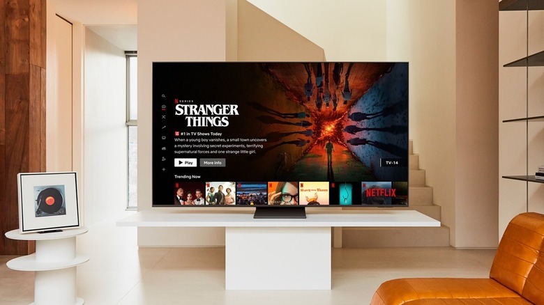 Samsung TV on white living room desk