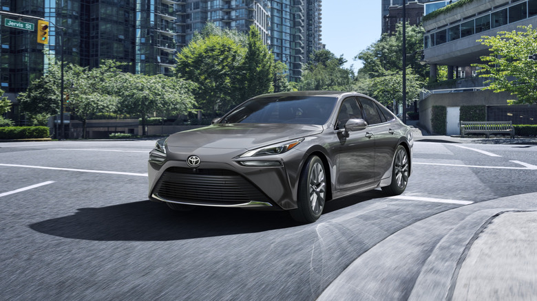 A gray 2025 Toyota Mirai on the road, front 3/4 view
