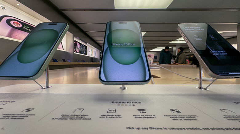 iPhone 15 models in Apple Store display