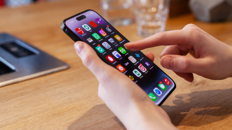 A person using an iPhone.