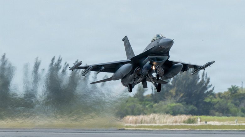 Front view of F-16 Fighter taking off from Homestead Air Reserve Base.