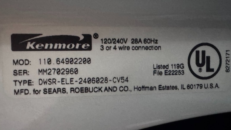 A close up of nameplate for a dryer, inside the dryer door