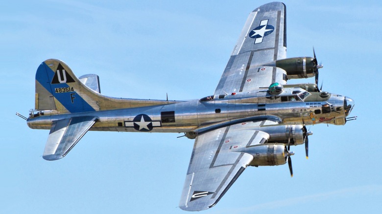 A B-17 Flying Fortress flying in an air show in 2014