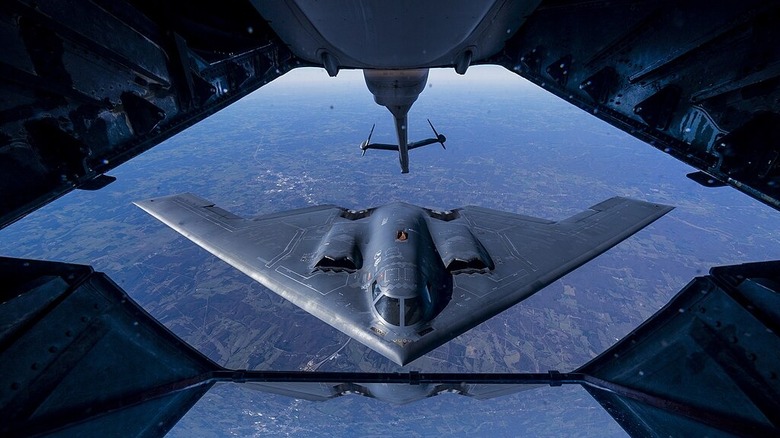 A B-2 Spirit preparing to refuel in the air during a training exercise