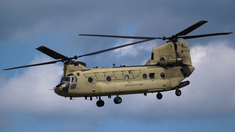 A Boeing Chinook helicopter flying in rough weather